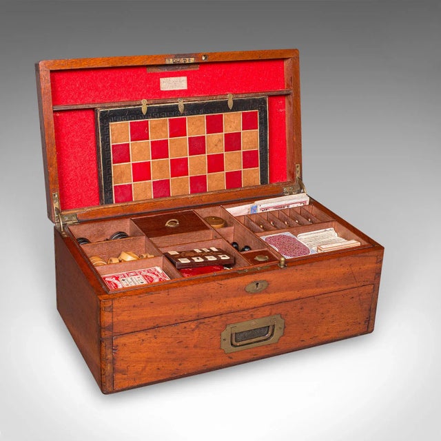 This is an antique games compendium. An English, mahogany gaming case by Gale & Lawday, dating to the Victorian period,...
