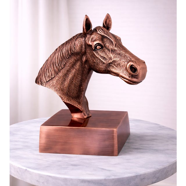 Add a bold statement of strength, elegance, and craftsmanship to your living space with this Antique Copper Finish Horse...