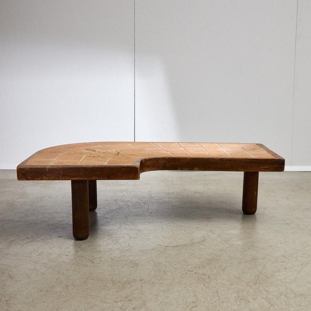 Presenting a stunning Barrois ceramic top table adorned with intricate floral designs, complemented by an oakwood frame....