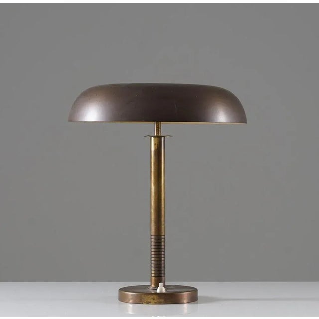 Rare table lamp model 8405 by Boréns, Sweden. This lamp is made of solid brass and features a beautiful perforated shade....