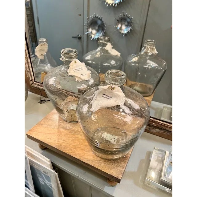 The Seeded Pebble Glass Vase Beautiful glass vase features molten glass that is taken from the furnace and rolled over...