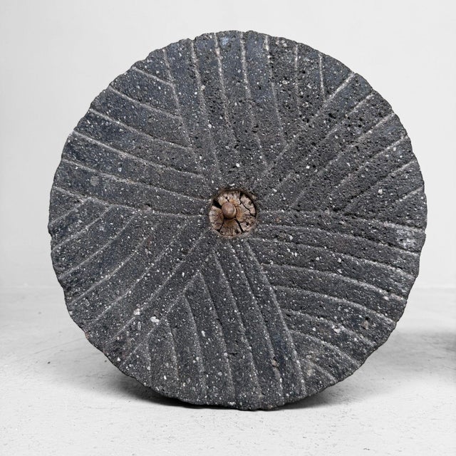 A powerful pair of Japanese stone grinding stones, probably dating from the late 19th to the first half of the 20th...