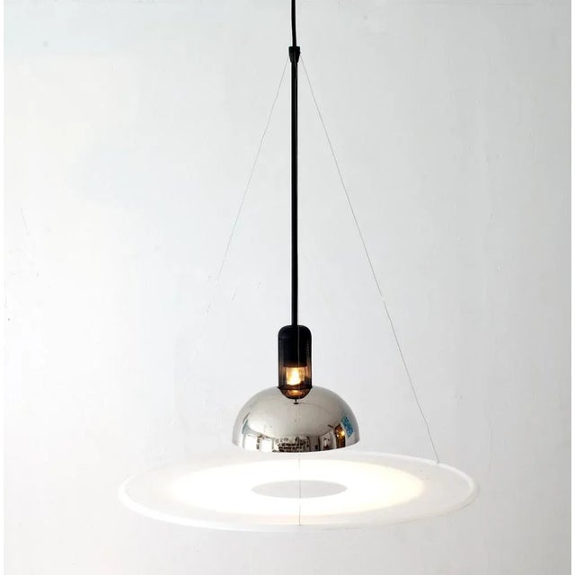 Frisbi Pendant Lamp by Achille Castiglioni for Flos, 1978, in Very Good conditions. Designed 1970 to 1979 This piece has...