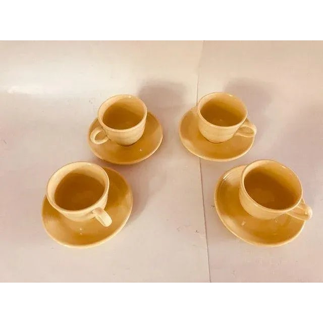 Vintage Yellow Set of 4 Cups and saucers set, Makers mark reads, Fiesta, Thy are in excellent condition.