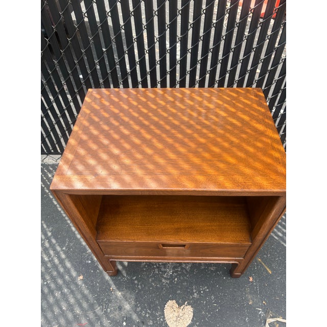 Mid century modern walnut nightstands attributed to John Stuart for Mount Airy “Janus” collection.