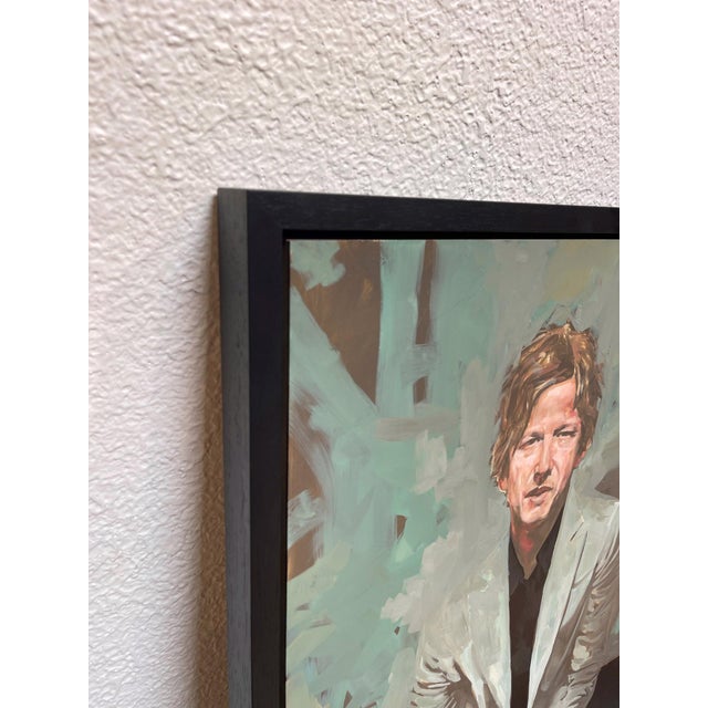 Figurative Portrait of Britt Daniel by Michael Carson | Oil on Panel Portrait of a man in a light jacket sitting. For Sale - Image 3 of 3