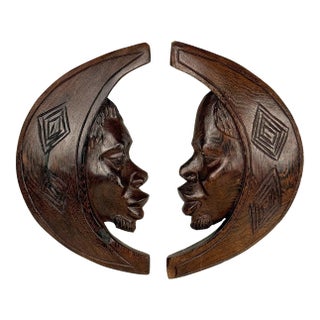 Vintage African Tribal Carved Crescent Moon Man & Women Wall Sculptures - A Pair For Sale