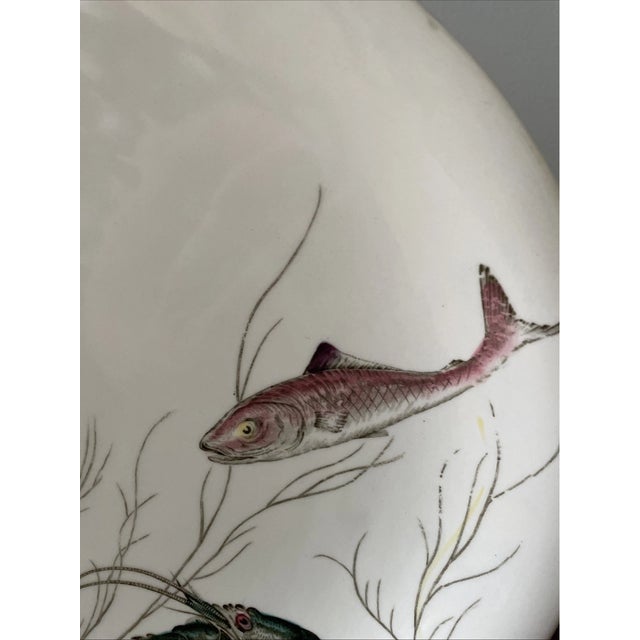 Classic vintage Johnson Brothers fish platter, crafted in England and featuring a traditional sea life design. This large...