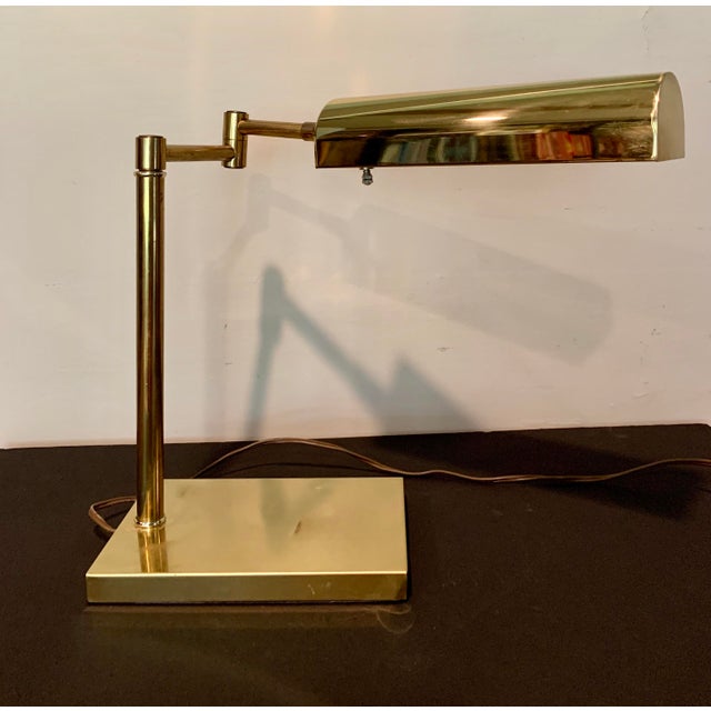 Wonderful and heavy vintage brass expandable arm pharmacy desk lamp.
