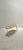 Carlo Malnati painterly wood table in a matte metallic gold. A rainbow of colors produce a besutiful abstract design...