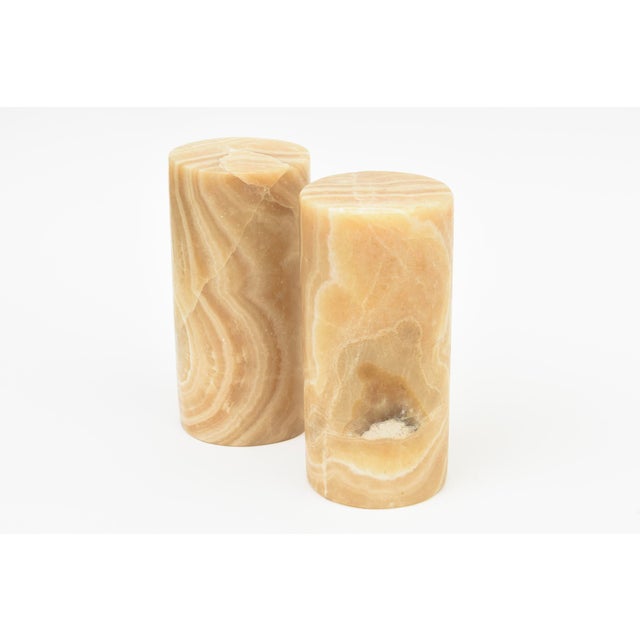 These lovely heavy vintage column alabaster bookends have variegated design elements inherent in the alabaster stone. The...