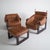 c. 1970s, Brazil - fully reupholstered in Maharam “Prone Ledge” leather. These are in excellent, restored condition but do...