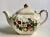 Circa 1940 James Sadler ceramic cube teapot in cream with fruit and gilt. Adorned with blossoms, blackberries, an apple,...