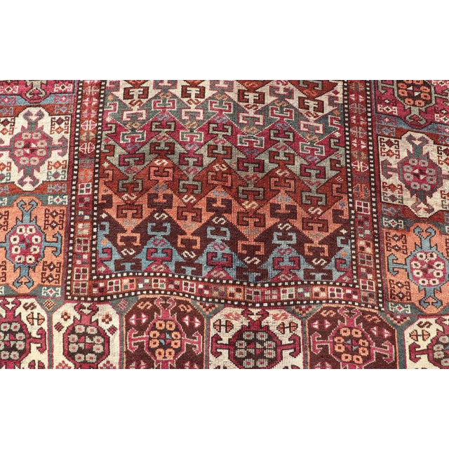 Measures: 4'1 x 9'9 Antique Persian Kurdish Rug with Vibrant Tribal Motifs and Rich Color 4'1 x 9'9. Keivan Woven Arts/...