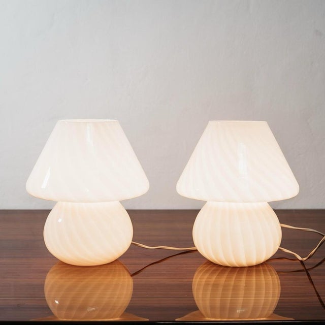 Wonderful pair of mushroom table lamps made entirely of original Murano glass from the 1970s era. Shaded powder-pink...