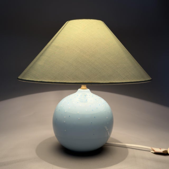 A charming modernist-style table lamp dating back to the 1970s. The item is signed Davinci on the protective felt base and...