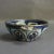 This Jugendstil ceramic bowl is hand painted in different colors and has gold decoration. It was designed by Andre Métthey...