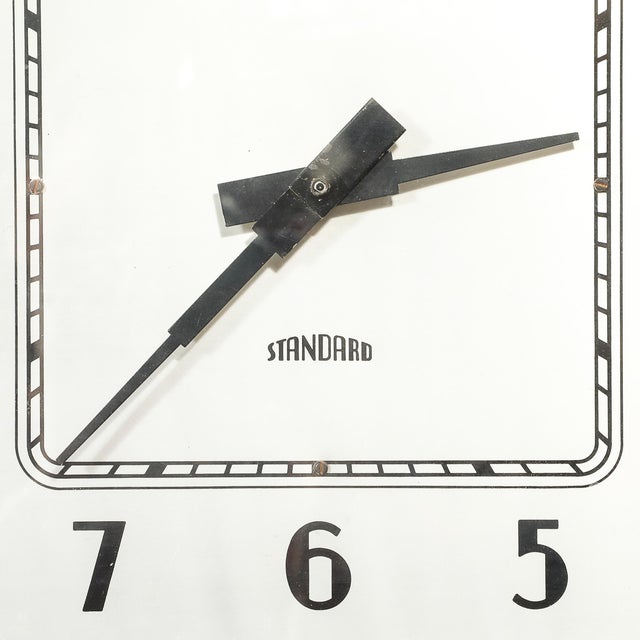 A remarkable Art Deco grandfather clock, crafted in America circa 1935, showcasing the iconic architectural influences of...