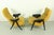 A spectacular and highly collectible pair of mid-century modern lounge chairs designed by the pioneer of Dutch design,...