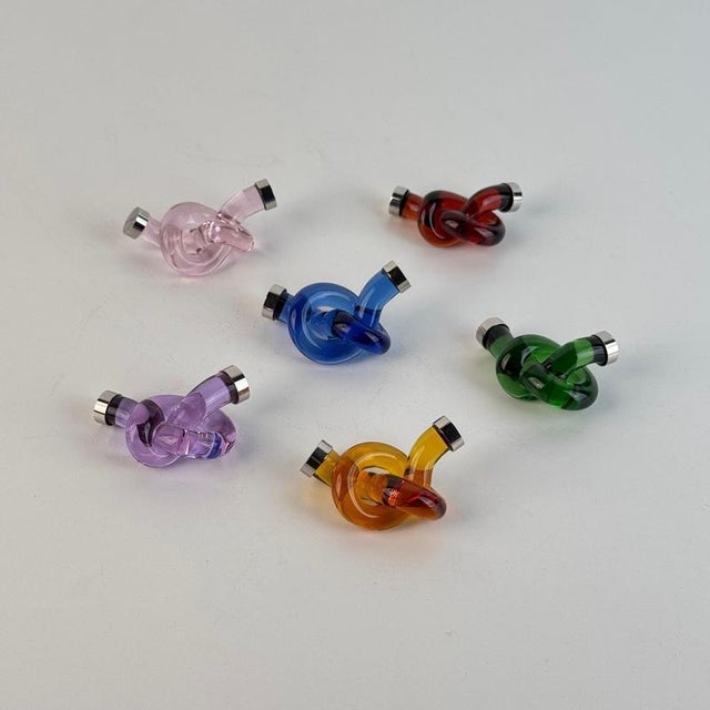A delightful set of six murano glass placeholders by venini vip, dating to the 1990s. Each piece is hand-crafted in a...