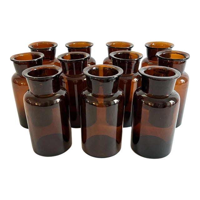 Early 20th Century Amber Belgian Apothecary Bottles – Set of 11 For Sale