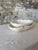 Beautiful raw white onyx bowls, each carved from natural stone and showcasing the unique veining, tonal variation, and...