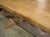 Early 1900’s French Dining Table With Shaped Trestle Supports and Cartouche Carvings For Sale - Image 17 of 18