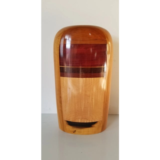 A beautiful vintage Paul La Montagne turned wood modernist Art Wood Vase. The vase has a curvelinear shape with an...