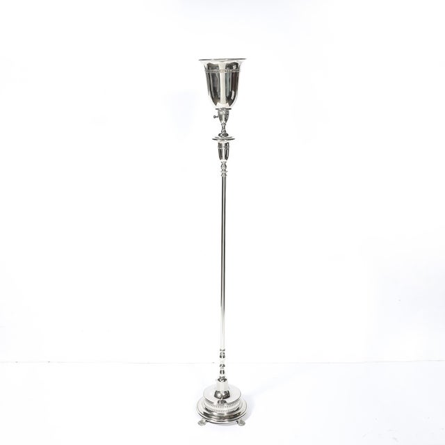 This stunning Classical Hollywood Regency silvered bronze torchiere, crafted in America circa 1945, exudes timeless...