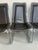 Chrome Cantilever dining chairs Italian made mid century. Comes with original leather seat cushions with snaps to hold in...