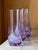 Add a touch of mid-century magic to your bar cart with this striking set of six vintage Alexandrite (neodymium) glass...