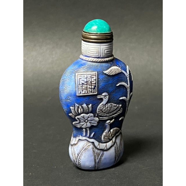 Chinese Art Overlay Peking Glass Snuff Bottle ITEM NAME: Chinese Art Overlay Peking Glass Snuff Bottle ORIGIN: China AGES:...
