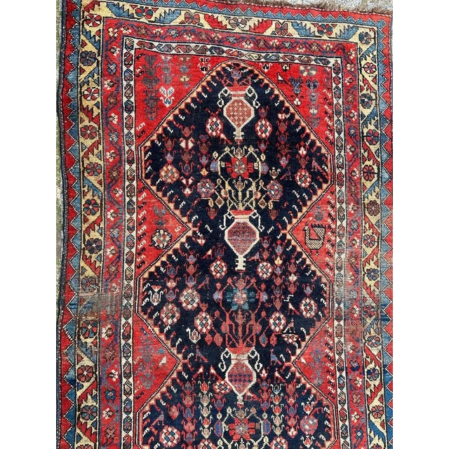 Beautiful late 19th century tribal rug from Azerbaijan area, with pretty geometrical and stylized designs with flowerpots,...