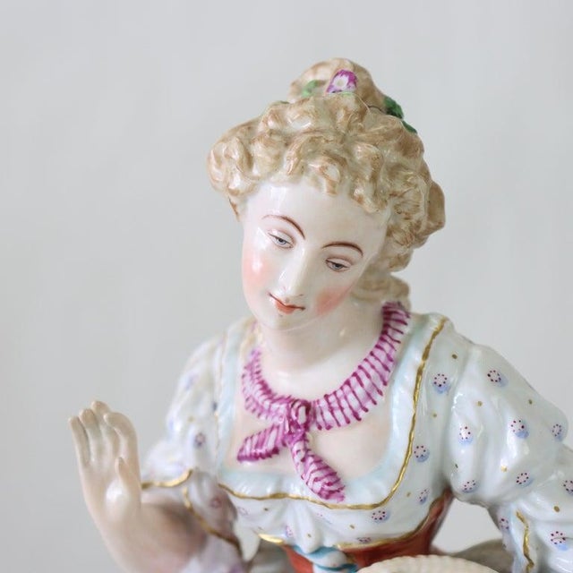 A charming pair of antique porcelain figures, in the manner of Meissen and dating to circa 1890. These finely crafted...
