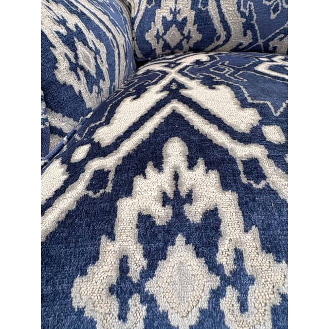 This is a pair of newly upholstered cut velvet club chairs. These club chairs have a classic straight Chippendale style...