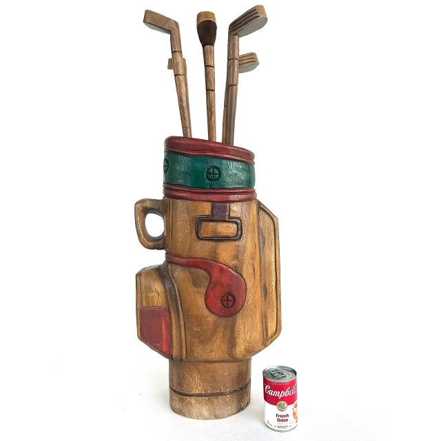 Vintage Life-sized Carved Wood Set of Golf Clubs, Sculpture, and Bag Offered for sale is a vintage 1960s set of carved...