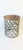 A silvered metal round drinks or side table with a Moorish design style, circa early-21st century. A silver-tone metal...