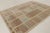 This 7x10 contemporary Scandinavian rug, hand-knotted in wool, features a geometric patchwork of architectural forms in...