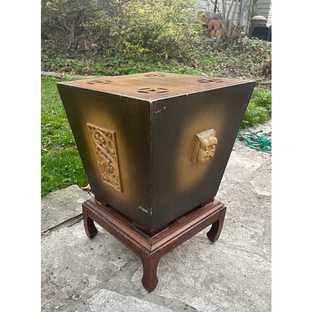 I've never seen one of these before! Fun piece to use for storage or even a side table. Great carving on all sides and fun...