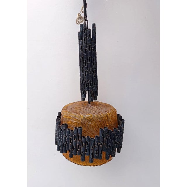 Beautiful brutalist-style chandelier unmarked, italian production attributed to marcello fantoni vintage wrought iron...