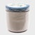 Used to store loose leaf tea, this small ceramic jar from the late 19th century is sparsely glazed in the classic blue-...
