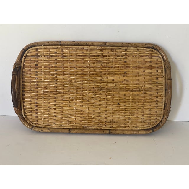 Handwoven vintage mid century bamboo rattan serving tray with handles.