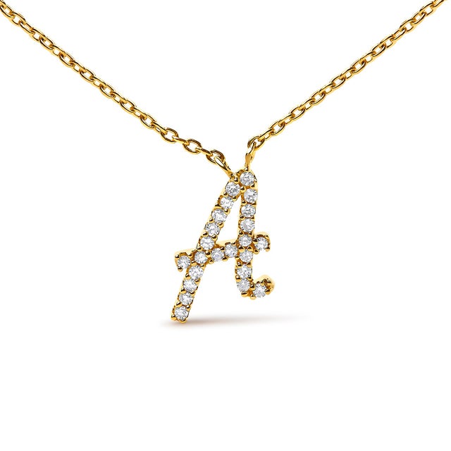 Embrace the elegance of personalization with this stunning 10K Yellow gold pendant, delicately crafted into a flowing...