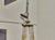 A refined 19th-century French chandelier combining neoclassical form with the luminous beauty of alabaster. The circular...