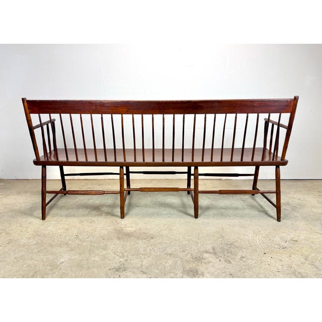 A wonderful farmhouse style handmade Windsor bench / settee with faux bamboo spindle turnings and single wide board seat,...