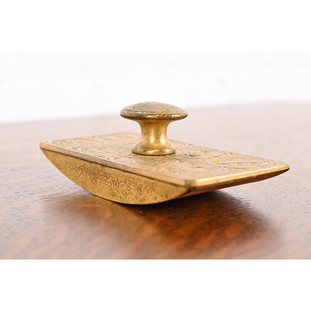 A gorgeous Arts & Crafts or Art Deco period gilt bronze "Zodiac" pattern rocker ink blotter By Tiffany Studios (signed on...