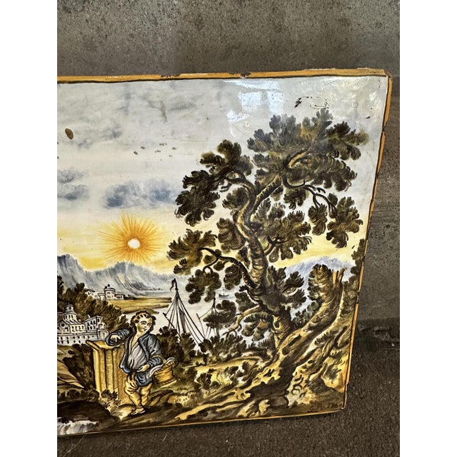 Castelli Majolica Tile Depicting a River Landscape with Architectural Ruins, Boats and Figures in the Foreground, 1970s,...