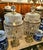 Elevate your space with this magnificent vintage crystal table lamp, featuring an ornate metal frame adorned with silver...