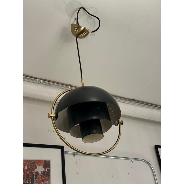 Design Plus Gallery presents a Multi-Lite Pendant by Louis Weisdorf for Gubi. First drawn in 1972 by Louis Weisdorf, this...