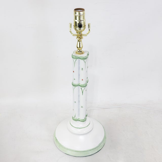 This elegant pair of vintage wooden table lamps features a classic faux bamboo carved design, perfect for adding a touch...